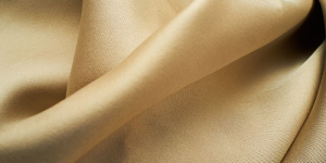 What are the advantages and disadvantages of triacetate fabric?  How much does triacetate fabric cost?  Composite fabric information